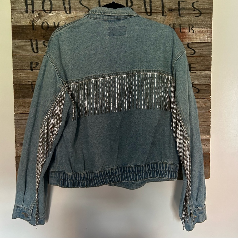 We The Free— FP Comet Rhinestone Fringe Denim
Bomber Jacket in Light Wash